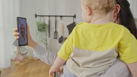 Caucasian mother holding little baby Stock Video Pond5