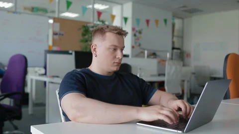 Caucasian office worker typing using laptop Stock Footage 112601279