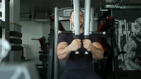 Caucasian pumped athlete doing another arm exercise in the gym in preparation Stock-Footage 136176322