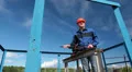 Caucasian senior manual worker maintaining gas valve gate HD Footage
