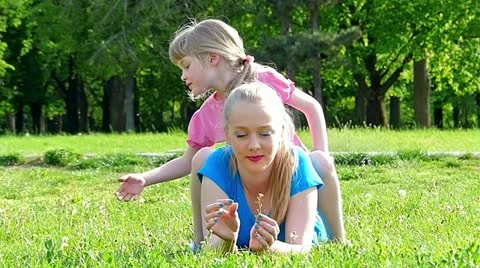Caucasian sisters having fun in the park slow motion Stock Footage 24673484