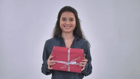 Caucasian smiling female with present Stock Footage 83367132