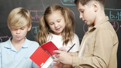 Caucasian student group checking robotic model while taking a note. Erudition. Stock Footage 277248542