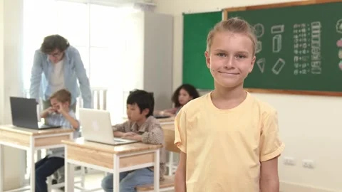 Caucasian student looking at camera while friend studying about code. Pedagogy. Stock Footage 282940879