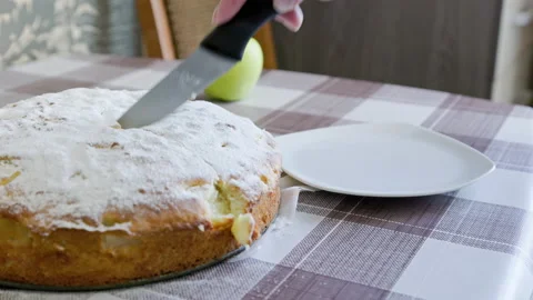 Caucasian woman cut triangular slice of classic apple pie and serving on white 스톡 동영상 196106233