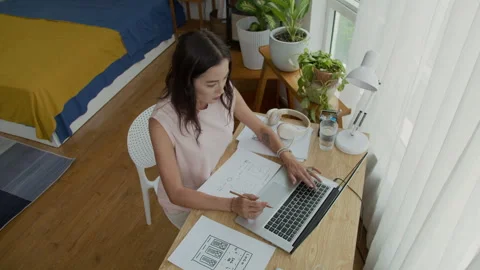 Caucasian Woman Developing Application Interface on Laptop at Home Office Stock Footage 300825161