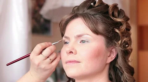 Caucasian woman face close-up with make-up applying Stock Footage