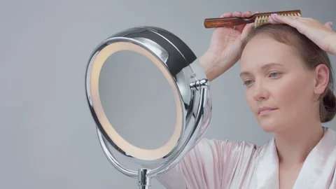 caucasian woman with mirror with ring li... | Stock Video | Pond5