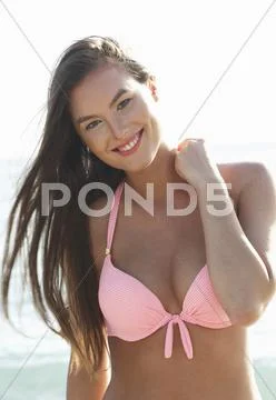 Caucasian Woman In Pink Bikini At Beach