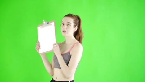 Caucasian woman studio greenscreen isolated sexy skinny 20s 4k sport fit slim Stock Footage