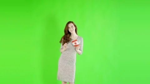 Caucasian woman studio greenscreen isolated sexy skinny 20s 4k casual long dress Stock Footage