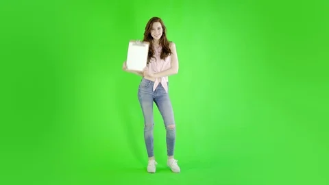 Caucasian woman studio greenscreen isolated sexy skinny 20s 4k casual jeans Stock Footage