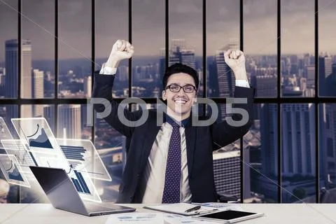 Caucasian worker with virtual chart on laptop Stock Photos