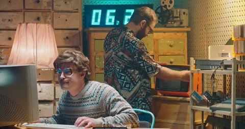 Caucasian young computer programist nerd in glasses working at vintage PC Stock-Footage 135630037