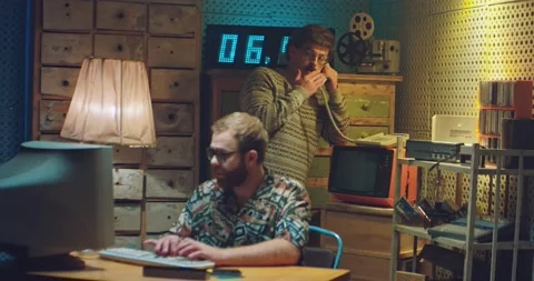 Caucasian young computer programist nerd in glasses sitting at vintage PC Stock-Footage 135632221