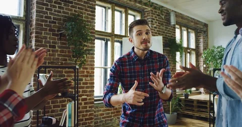 Caucasian young joyful man startupper having fun in the urban office and Stock Footage 100991615