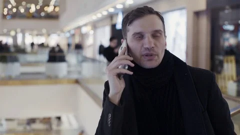Caucasian young men using smartphone at shopping mall. Portrait Video stock 74161967