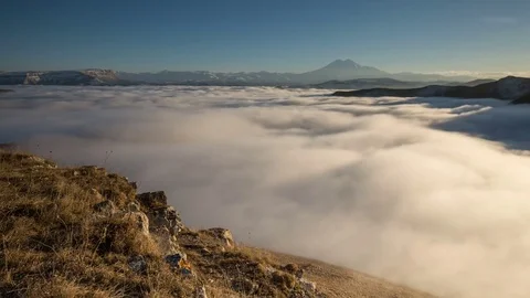 Caucasus. The formation of winter clouds above the volcano Elbrus Stock Footage 70301098