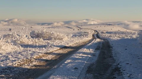 Caucasus. The formation of winter clouds above the volcano Elbrus Stock Footage 70409039