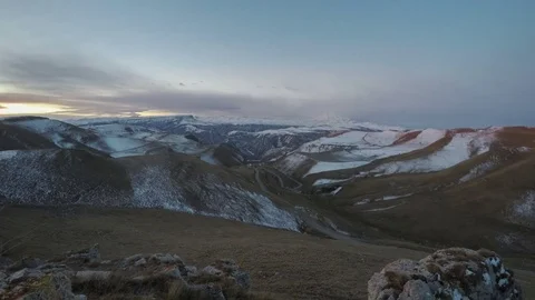 Caucasus. The formation of winter clouds above the volcano Elbrus Stock Footage 70976679