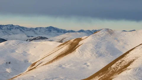 Caucasus. The formation of winter clouds above the volcano Elbrus Stock Footage 72588039
