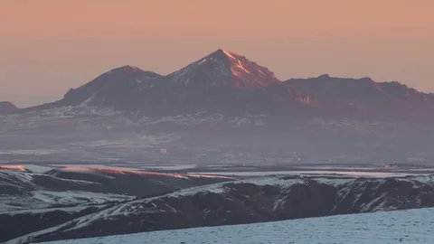 Caucasus. The formation of winter clouds above the volcano Elbrus Stock Footage 72588396