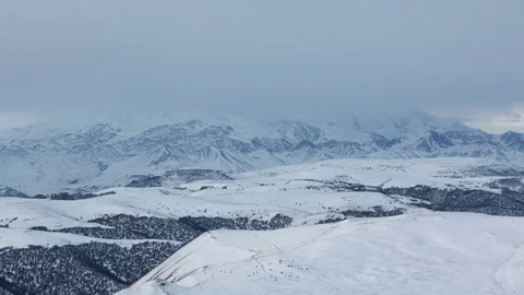 Caucasus. The formation of winter clouds above the volcano Elbrus Stock Footage 72589319
