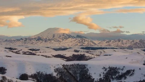 Caucasus. The formation of winter clouds above the volcano Elbrus Stock Footage 72612651