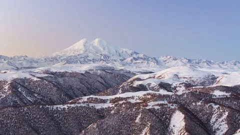 Caucasus. The formation of winter clouds above the volcano Elbrus Stock Footage 72613193
