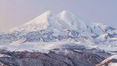 Caucasus. The formation of winter clouds above the volcano Elbrus Stock Footage 72613254