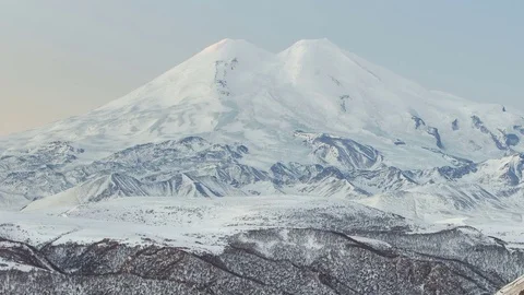 Caucasus. The formation of winter clouds above the volcano Elbrus Stock Footage 72613526