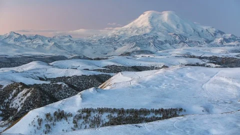Caucasus. The formation of winter clouds above the volcano Elbrus Stock Footage 72615464