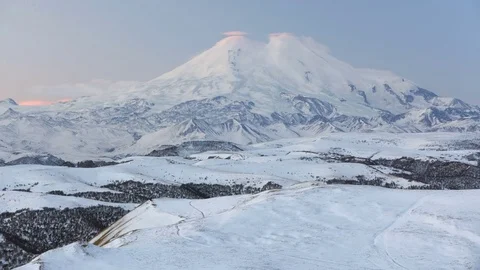 Caucasus. The formation of winter clouds above the volcano Elbrus Stock Footage 72617063