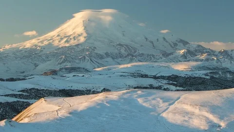 Caucasus. The formation of winter clouds above the volcano Elbrus Stock Footage 72617531