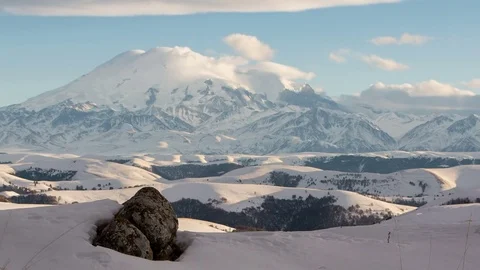 Caucasus. The formation of winter clouds above the volcano Elbrus Stock Footage 72618869