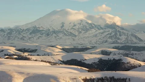 Caucasus. The formation of winter clouds above the volcano Elbrus Stock Footage 72619080