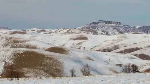 Caucasus. The formation of winter clouds above the volcano Elbrus Stock Footage 72623671
