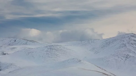 Caucasus. The formation of winter clouds above the volcano Elbrus Stock Footage 72624550