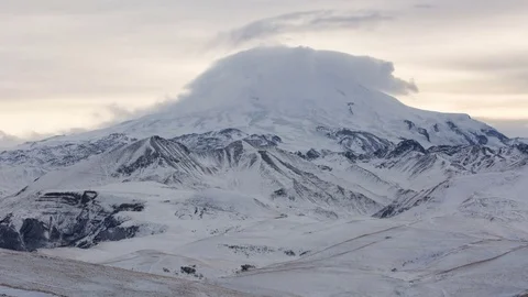 Caucasus. The formation of winter clouds above the volcano Elbrus Stock Footage 72626352