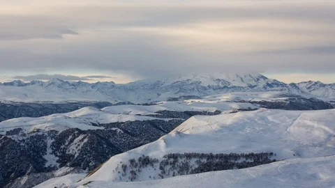 Caucasus. The formation of winter clouds above the volcano Elbrus Stock Footage 72626863