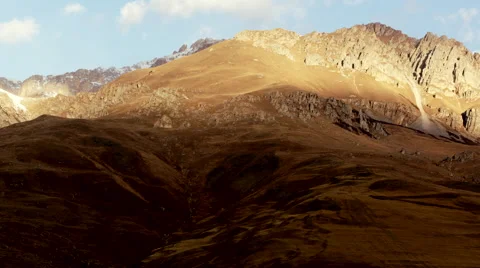 Caucasus Mountains in Cloudy Sunny Day Stock Footage 61232880