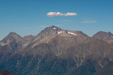 The Caucasus mountains in the rays of the setting sun Stock Photos