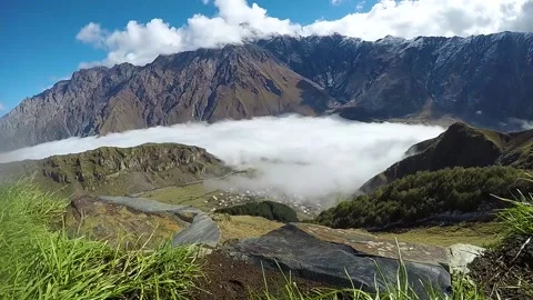 Caucausus mountains in early fall. Fast moving fog, scenic view, time-lapse. Stock Footage 130902870