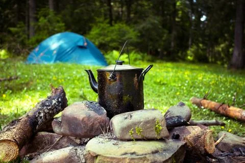 Cauldron and tent Foto stock