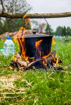 Cauldron on campfire Stock Photos