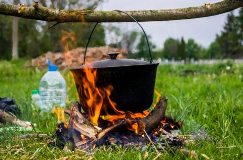 Cauldron on campfire Stock Photos