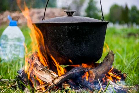 Cauldron on campfire Stock Photos