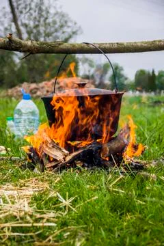 Cauldron on campfire Stock Photos
