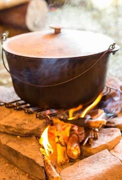 Cauldron on the fire, cooking in the field.... cauldron on the fire, cooking  Stock Photos