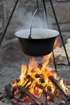 Cauldron on fire Stock-Fotos